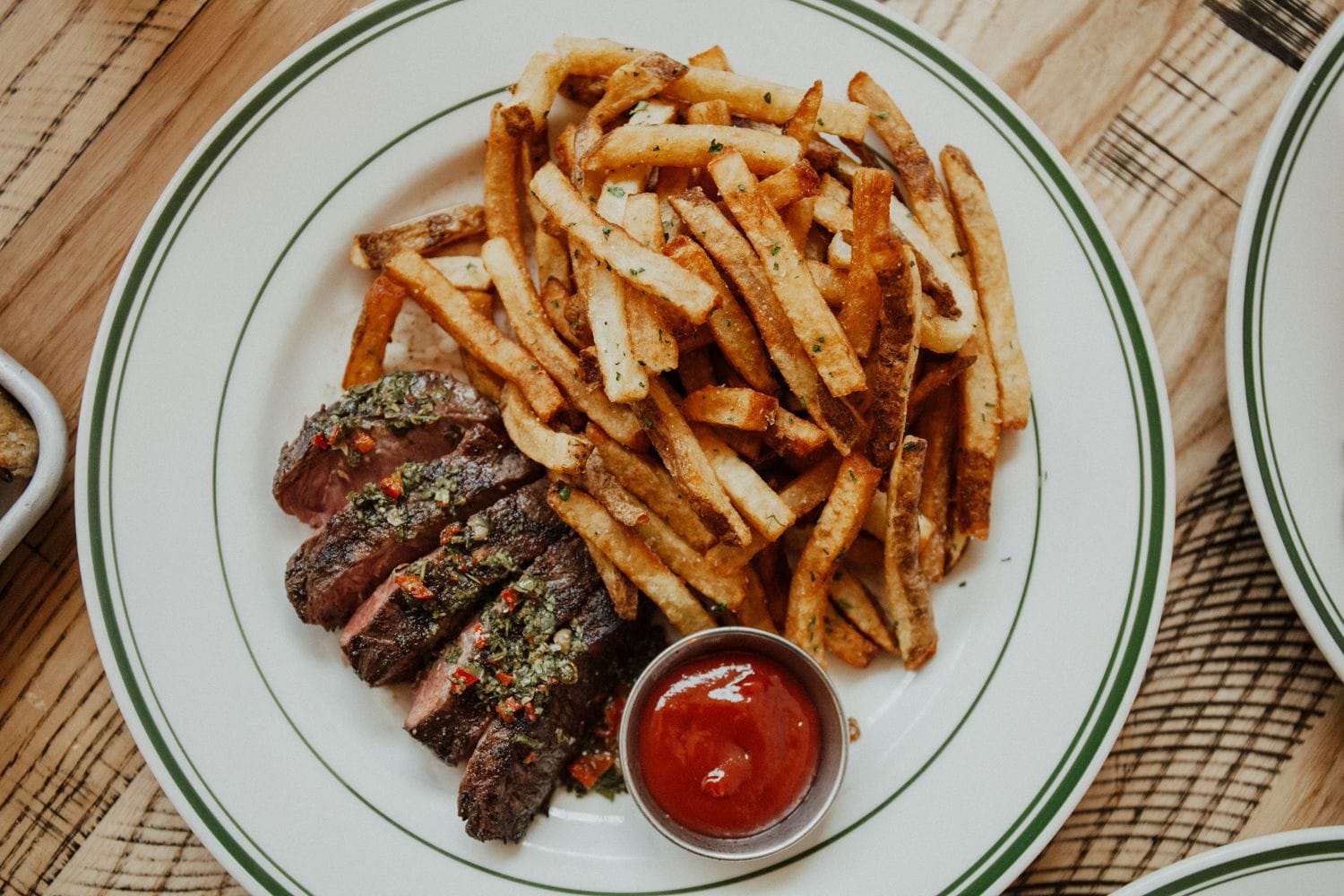 close up shot of steak and fries